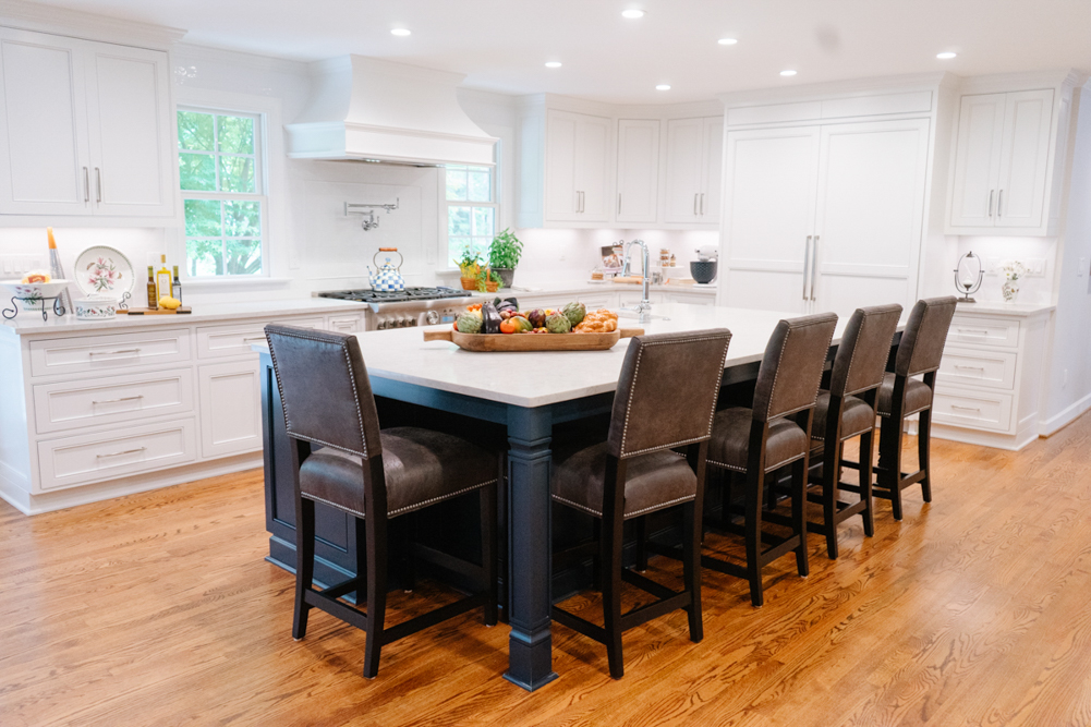 Enlarged gourmet kitchen with a large island in the Buckingham Way home
