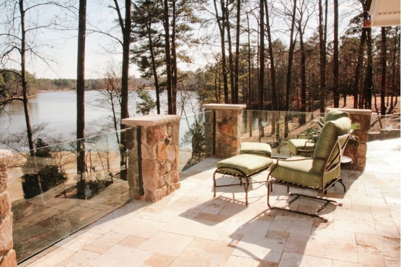 Outdoor patio overlooking a lake at the Dunedin project